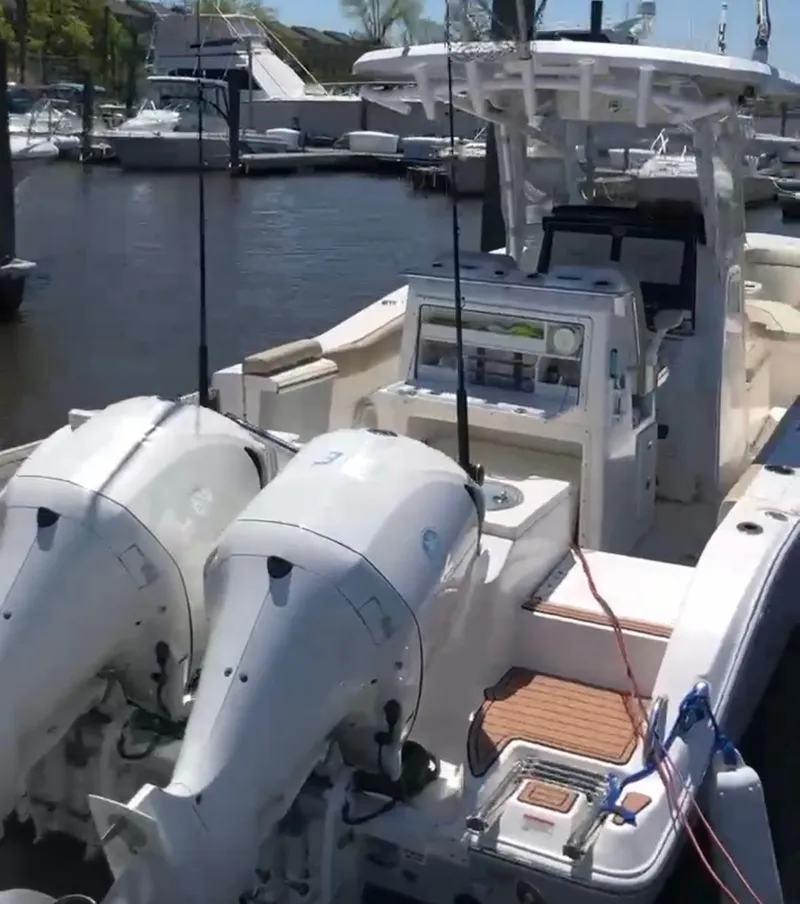 Slide: The Image of 2017 Sea Fox 288 Commander boat docked with dual outboard engines. - 20
