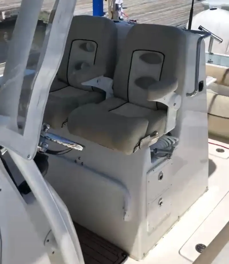 Slide: The Image of 2017 Sea Fox 288 Commander boat seats with armrests and console. - 28