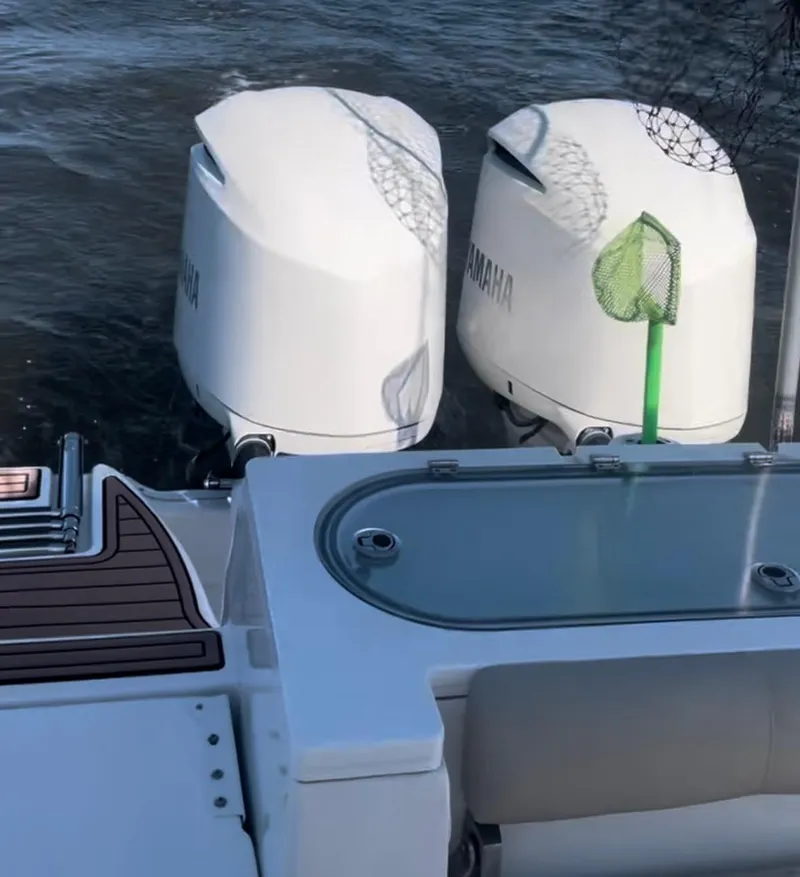 Slide: The Image of 2017 Sea Fox 288 Commander with twin Yamaha outboard motors on water. - 38