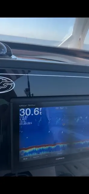 Slide: The Image of Dashboard of 2017 Sea Fox 288 Commander with Garmin display showing depth. - 41