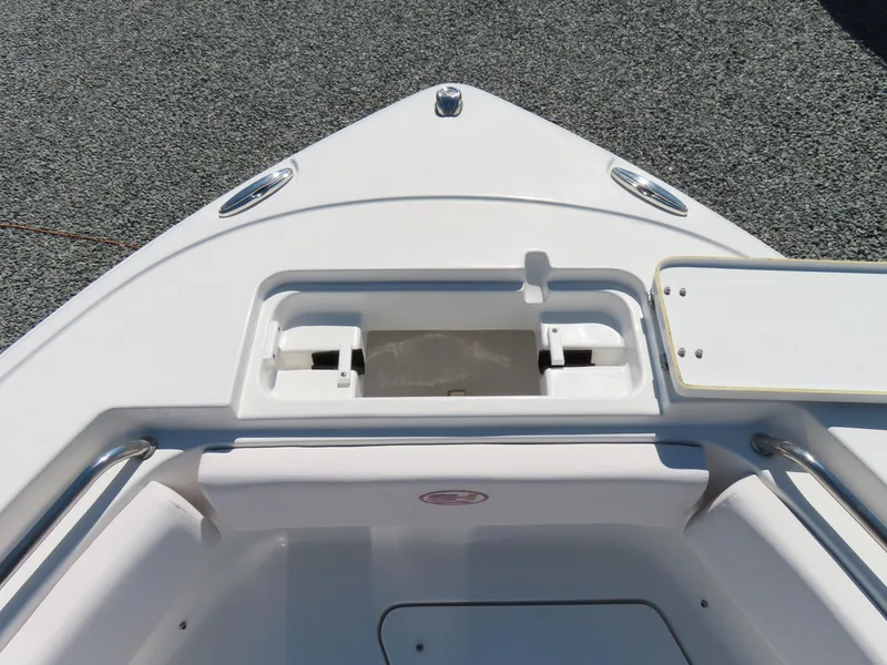 Slide: The Image of Bow of 2021 Sea Hunt Ultra 219 boat with storage compartment. - 13