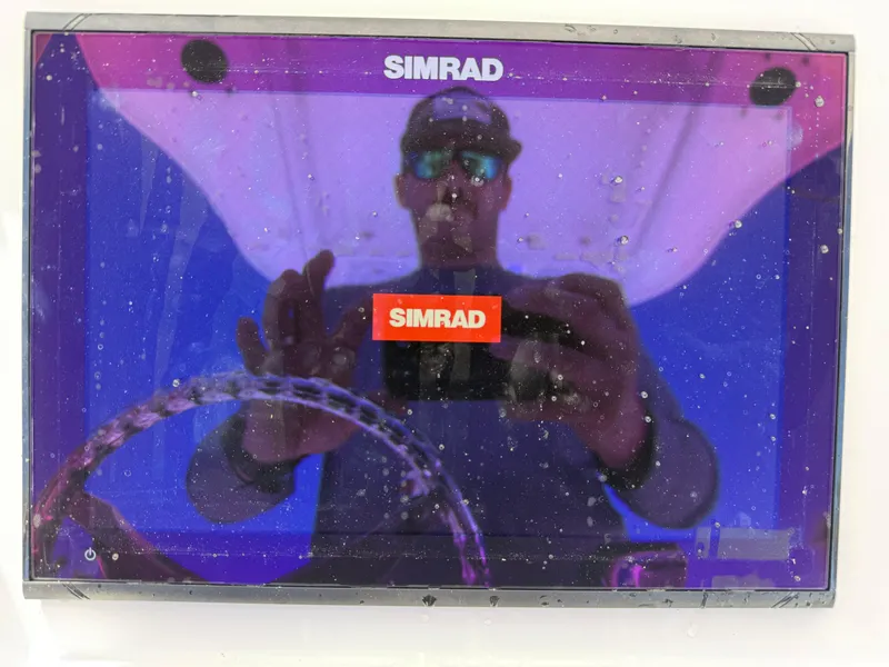 Slide: The Image of Reflection on Simrad display screen aboard 2018 Everglades 230 Center Console boat. - 34