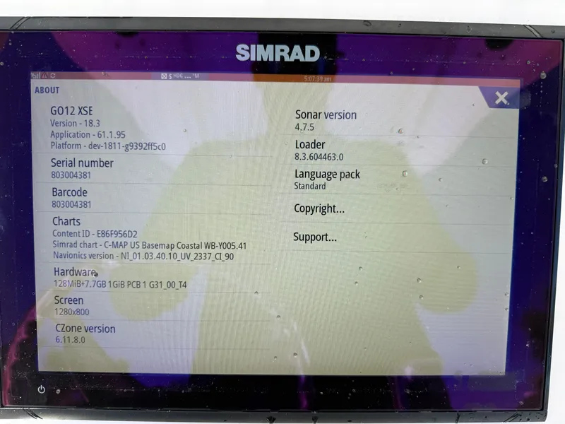 Slide: The Image of Simrad display showing system information on Everglades 230 Center Console, 2018 model. - 36