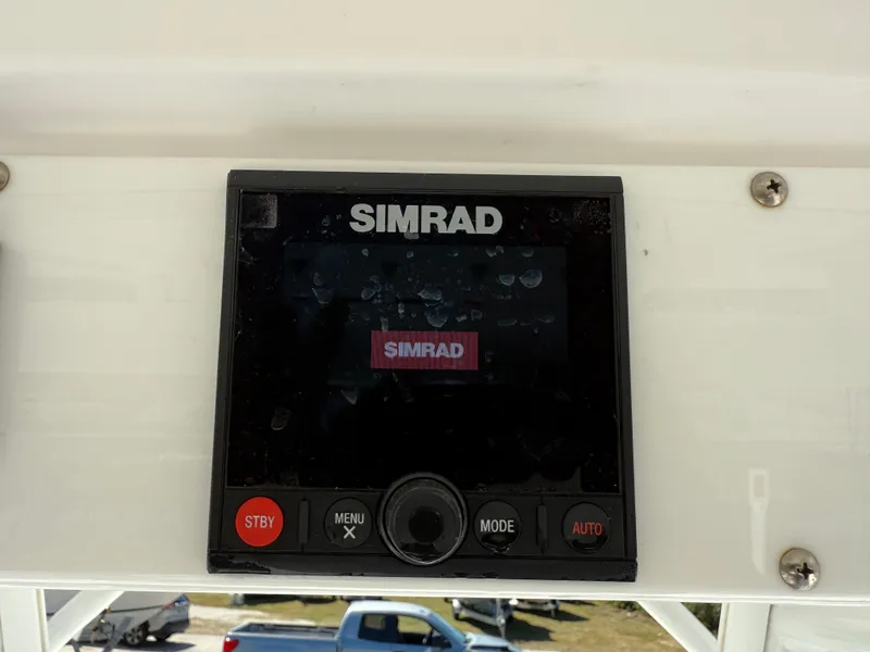 Slide: The Image of Simrad display on 2018 Everglades 230 Center Console boat dashboard. - 41