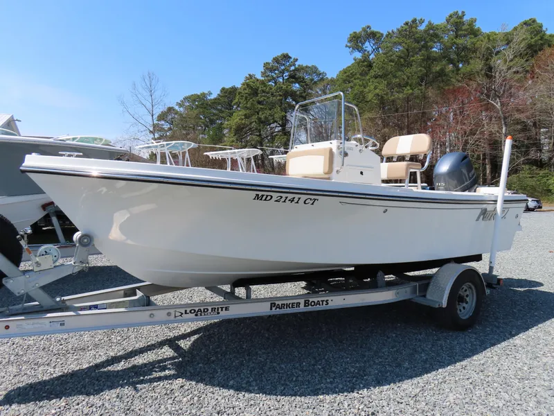 Slide: The Image of 2018 Parker 1801 Center Console boat on trailer, parked outdoors. - 1