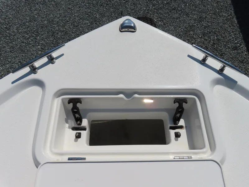 Slide: The Image of Bow storage compartment of 2018 Parker 1801 Center Console boat. - 12