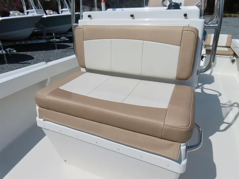 Slide: The Image of 2018 Parker 1801 Center Console boat seat with beige and white upholstery. - 16