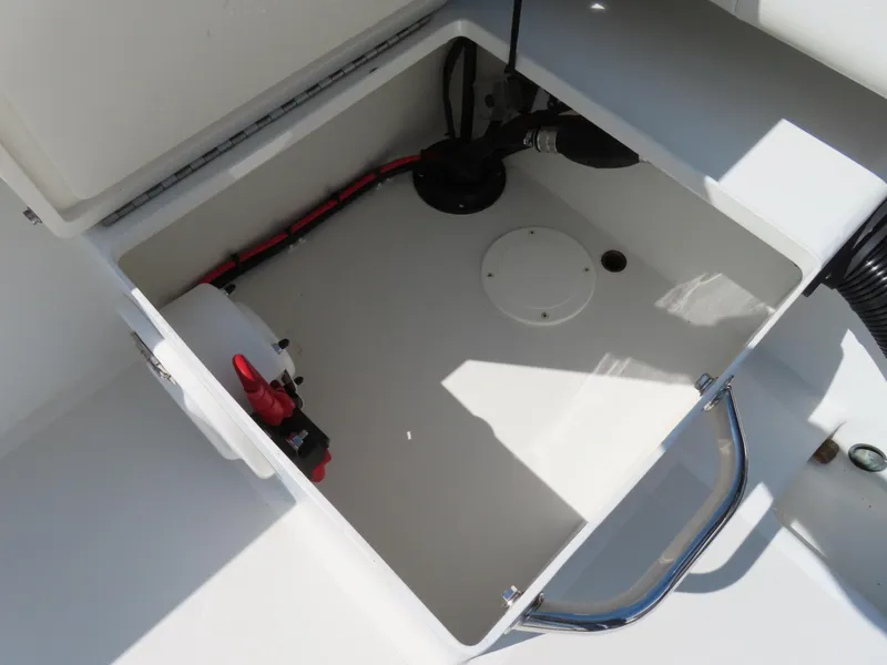 Slide: The Image of Open storage compartment in 2018 Parker 1801 Center Console boat. - 28