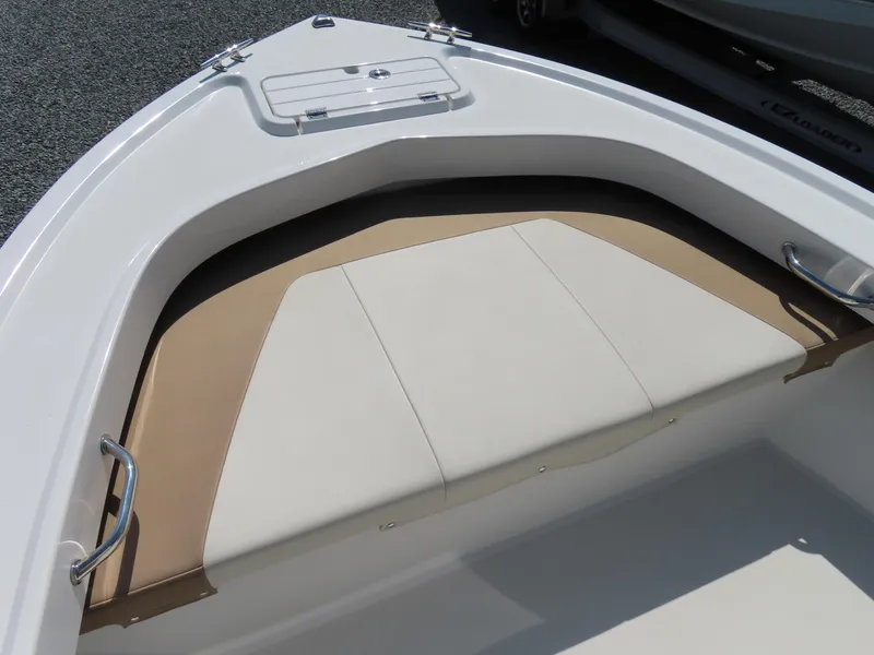 Slide: The Image of 2018 Parker 1801 Center Console boat with cushioned seating and storage compartment. - 8