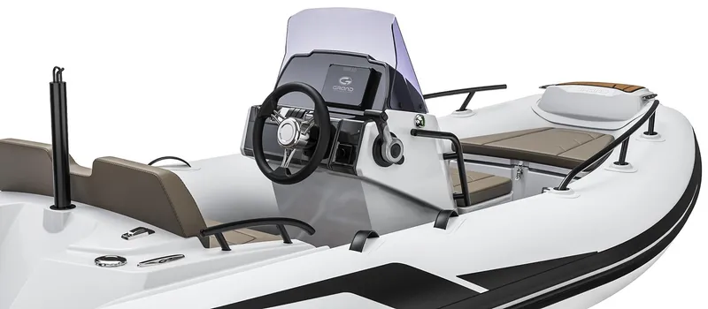 Slide: The Image of 2025 Grand G420 boat interior with steering console and seating. - 4