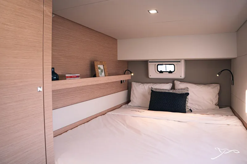 Slide: The Image of Luxurious cabin interior of 2025 Nautitech 40 Open catamaran with cozy bedding and modern design. - 45