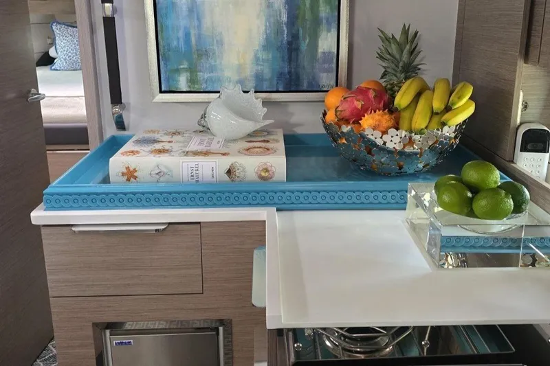 Slide: The Image of Modern kitchen interior on 2023 Hanse 460 yacht with fruit bowl and decorative elements. - 18