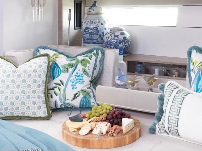 Slide: The Image of Luxurious interior of 2023 Hanse 460 yacht with elegant decor and gourmet platter. - 19