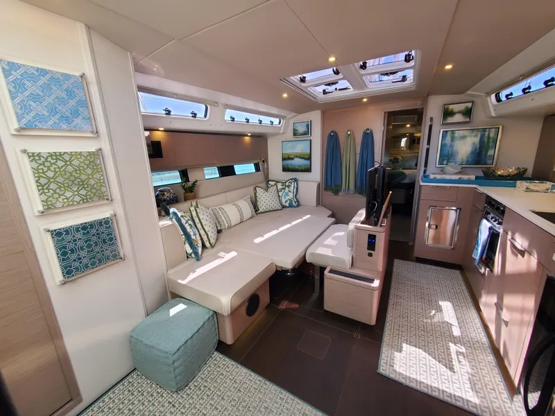 Slide: The Image of Luxurious interior of 2023 Hanse 460 yacht with modern decor and ample natural light. - 23