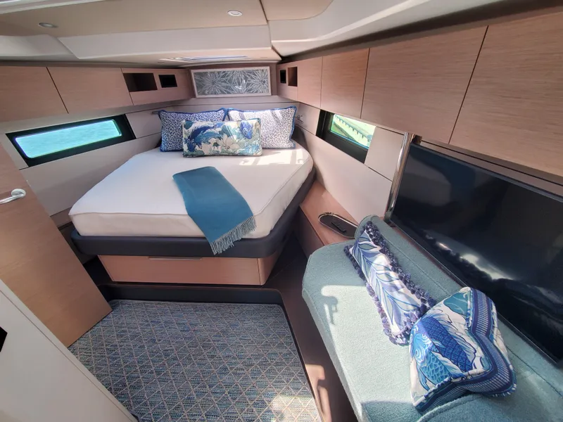 Slide: The Image of Luxurious cabin interior of 2023 Hanse 460 yacht with bed, sofa, and modern decor. - 7