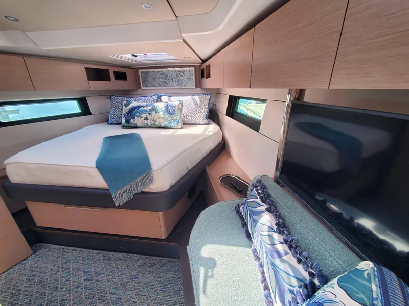 Slide: The Image of Luxurious cabin interior of 2023 Hanse 460 yacht with cozy bed and elegant decor. - 8