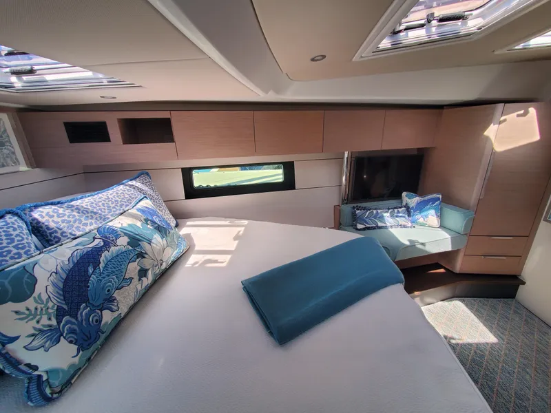 Slide: The Image of Luxurious 2023 Hanse 460 yacht cabin with elegant bedding and modern design. - 9