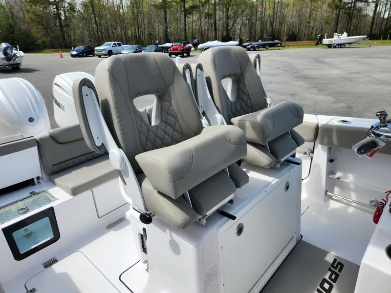 Slide: The Image of 2025 Sportsman Heritage 261 Center Console boat seats, featuring modern design and comfort. - 17