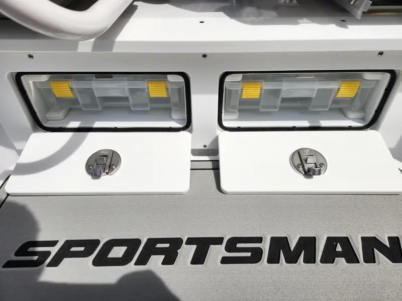 Slide: The Image of 2025 Sportsman Heritage 261 Center Console deck with storage compartments. - 20