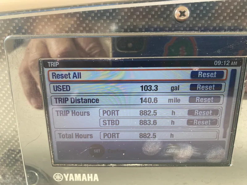 Slide: The Image of Yamaha boat display showing fuel usage, trip distance, and engine hours for Grady-White Canyon 2016. - 13