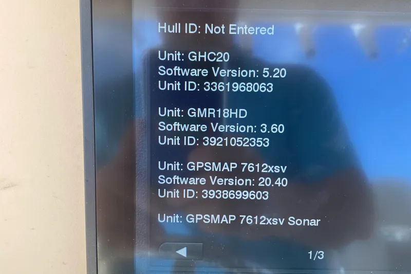 Slide: The Image of Display screen showing software versions and unit IDs for Grady-White Canyon 2016 boat systems. - 17