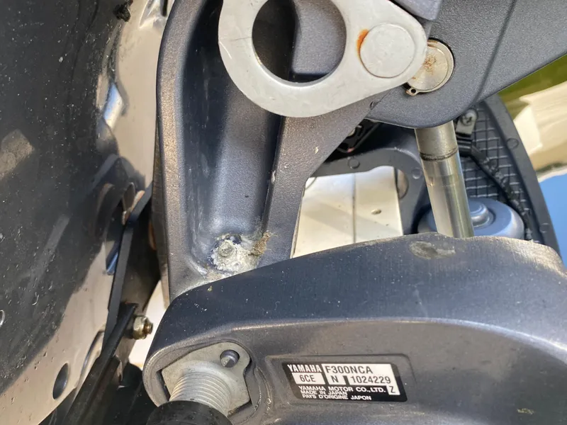 Slide: The Image of Close-up of a 2016 Grady-White Canyon boat engine component with visible Yamaha label. - 18