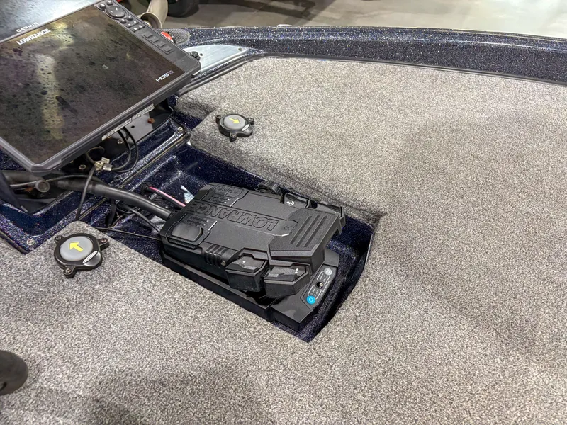 Slide: The Image of 2020 Phoenix 921 ELITE boat deck with electronic equipment and control panel. - 11