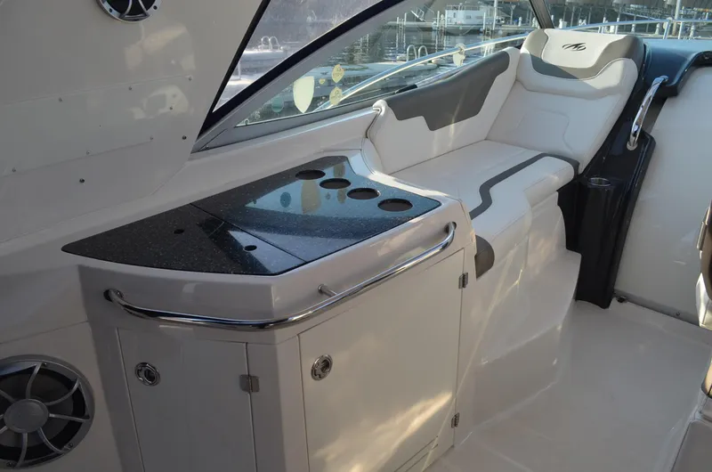 Slide: The Image of 2013 Monterey 340 SY yacht interior with seating and countertop. - 13