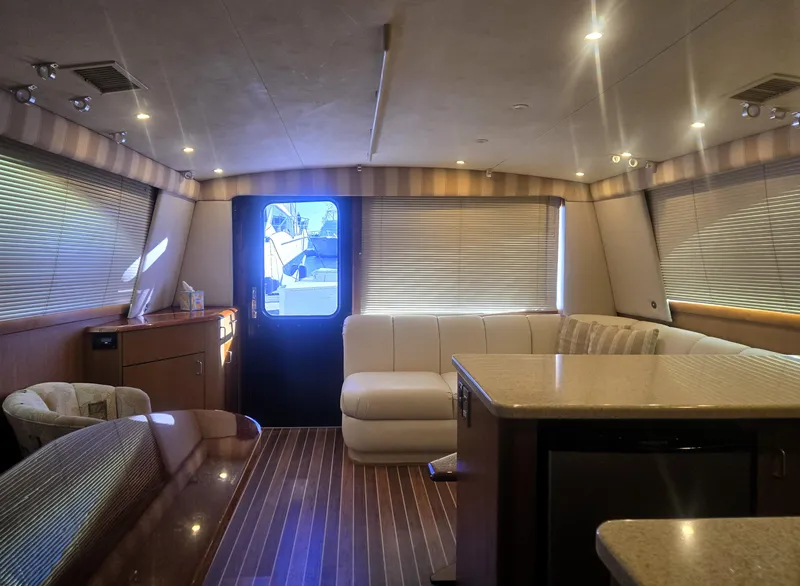Slide: The Image of Luxurious interior of 2001 Ocean Yachts 43 Super Sport with elegant seating and modern amenities. - 16