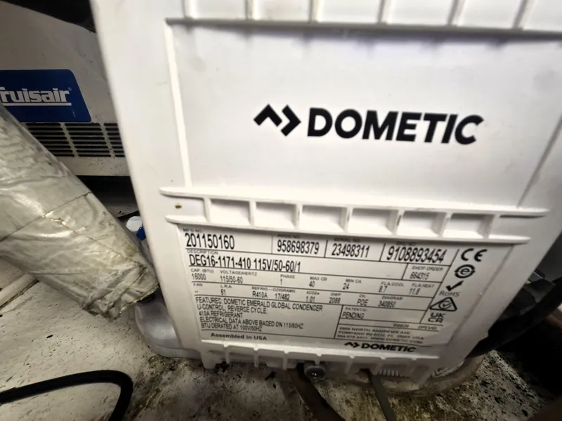 Slide: The Image of Dometic unit label on Ocean Yachts 43 Super Sport, 2001 model. - 27