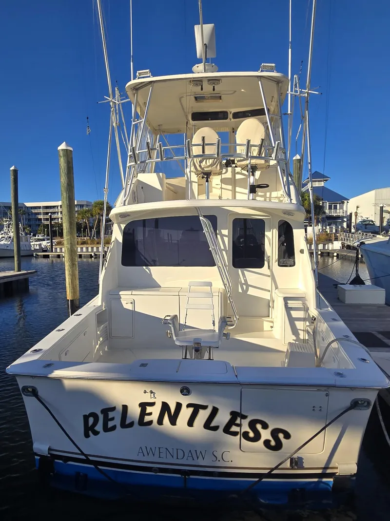 Slide: The Image of 2001 Ocean Yachts 43 Super Sport boat docked, named "Relentless," in Awendaw, S.C. - 4