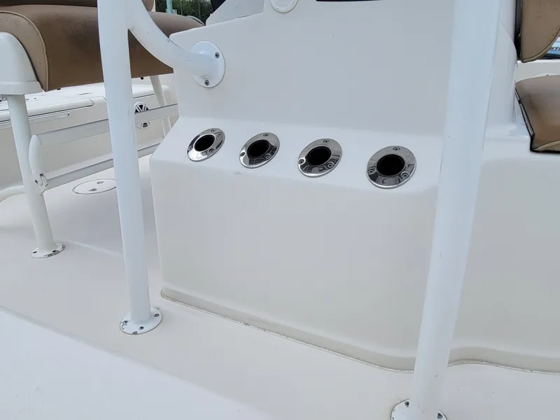Slide: The Image of 2016 Ranger 220 Bahia boat console with rod holders and seating. - 18