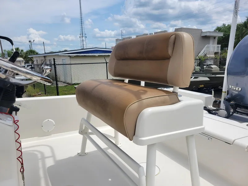 Slide: The Image of Ranger 220 Bahia 2016 boat seat, beige upholstery, outdoor setting, clear sky. - 9