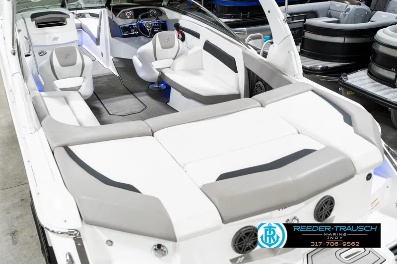 Slide: The Image of 2021 Four Winns H260 boat interior with spacious seating and modern design. - 15