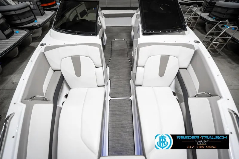 Slide: The Image of 2021 Four Winns H260 boat interior with sleek seating and modern design. - 22