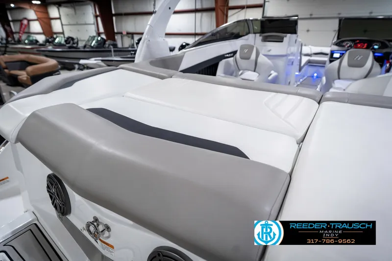 Slide: The Image of 2021 Four Winns H260 boat interior with cushioned seating and modern design. - 37