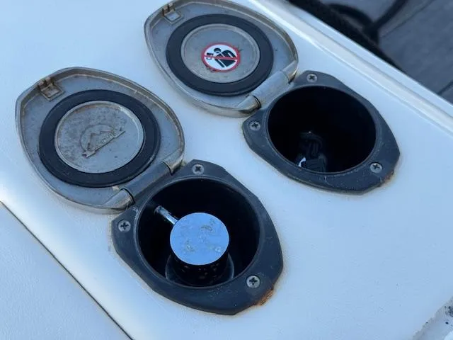 Slide: The Image of Fuel and water caps on a 2021 Grady-White Freedom 335 boat. - 31