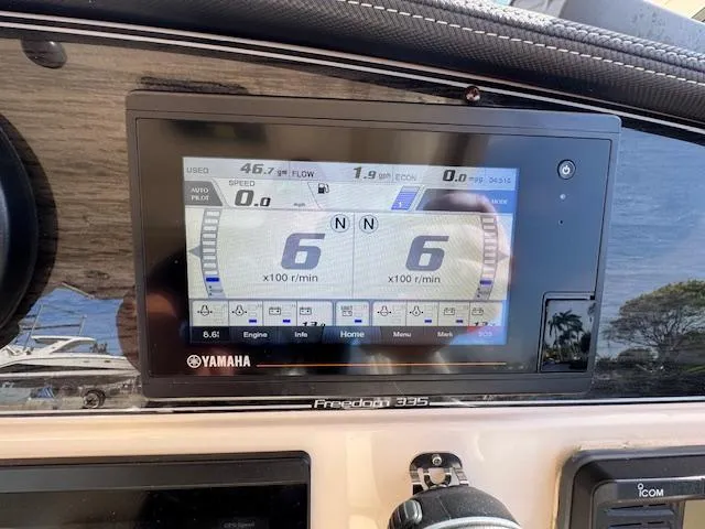 Slide: The Image of Dashboard of 2021 Grady-White Freedom 335 boat with Yamaha display showing engine data. - 35