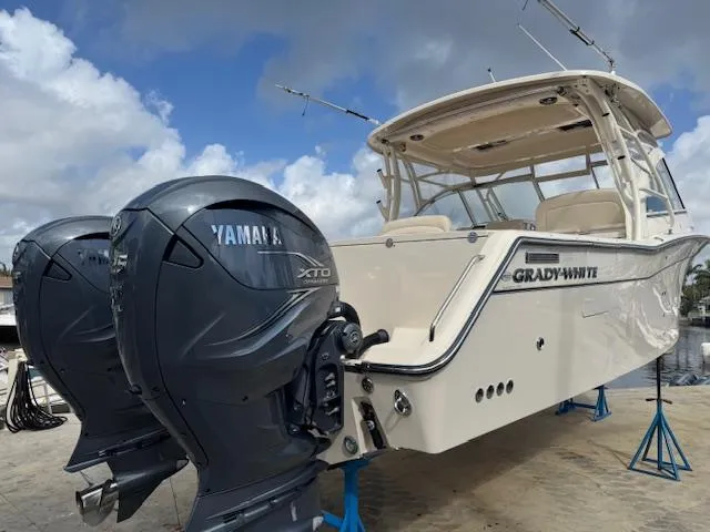 Slide: The Image of 2021 Grady-White Freedom 335 boat with Yamaha XTO engines on display. - 6