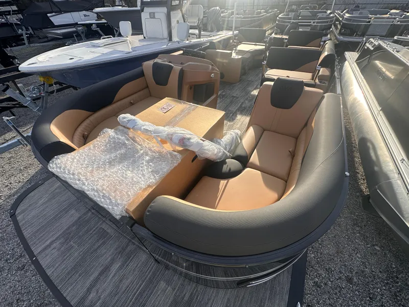 Slide: The Image of 2025 Avalon LSZ Quad Lounger Shift pontoon boat with luxurious seating and modern design. - 6