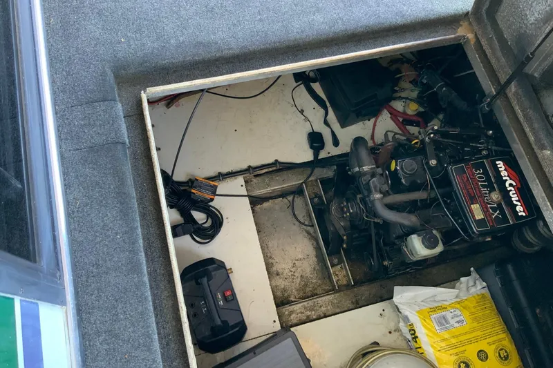 Slide: The Image of Engine compartment of a 1997 Lakeview 16 x 65 houseboat with Mercury engine. - 46
