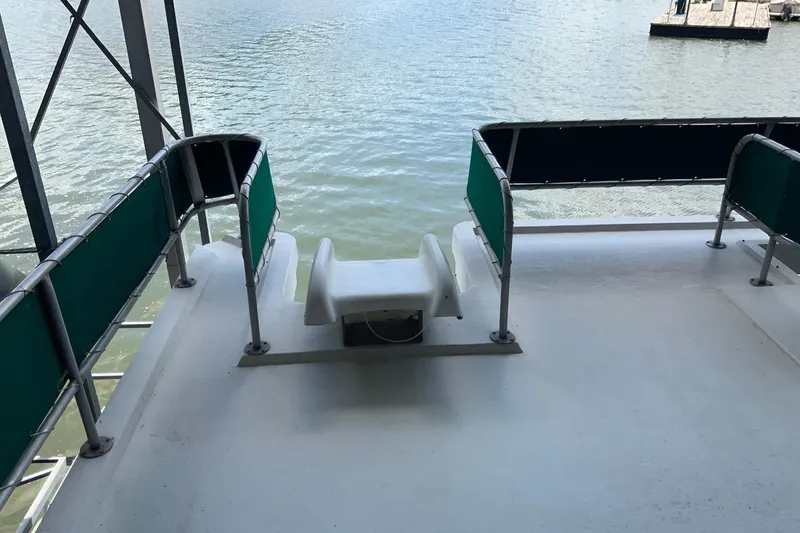 Slide: The Image of Rear deck of 1997 Lakeview 16 x 65 houseboat overlooking water. - 6