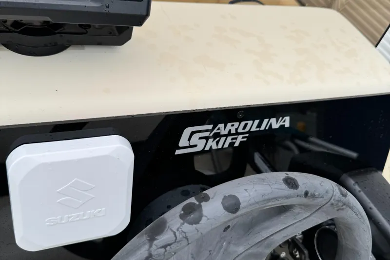 Slide: The Image of 2001 Carolina Skiff 17 Center Console with Suzuki 40HP engine, close-up view. - 4