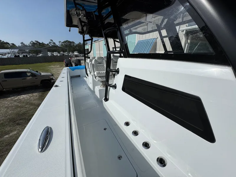 Slide: The Image of 2025 Invincible 46 Catamaran deck view with sleek design and modern features. - 23