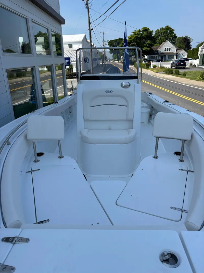 Slide: The Image of 2026 Sea Hunt Ultra 219 boat with spacious seating and modern design. - 3