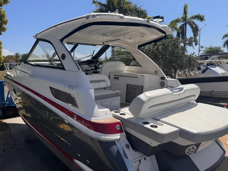Slide: The Image of 2019 Regal 35 Sport Coupe boat with sleek design, spacious deck, and modern features. - 1
