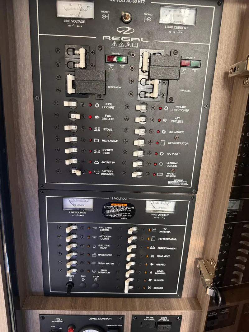 Slide: The Image of Electrical control panel of a 2019 Regal 35 Sport Coupe boat. - 24