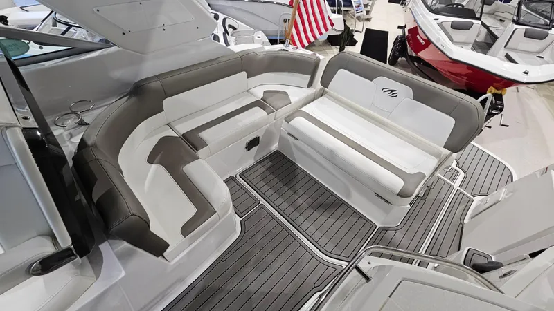 Slide: The Image of 2020 Monterey 295 Sport Yacht interior with sleek seating and modern design. - 11