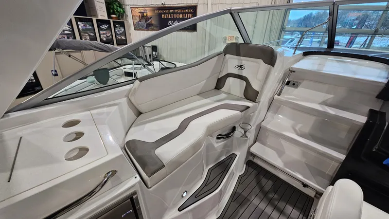Slide: The Image of 2020 Monterey 295 Sport Yacht interior with sleek seating and modern design. - 16