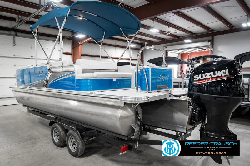 Slide: The Image of 2025 Avalon 2285 LSZ CRB pontoon boat with Suzuki engine in showroom. - 10